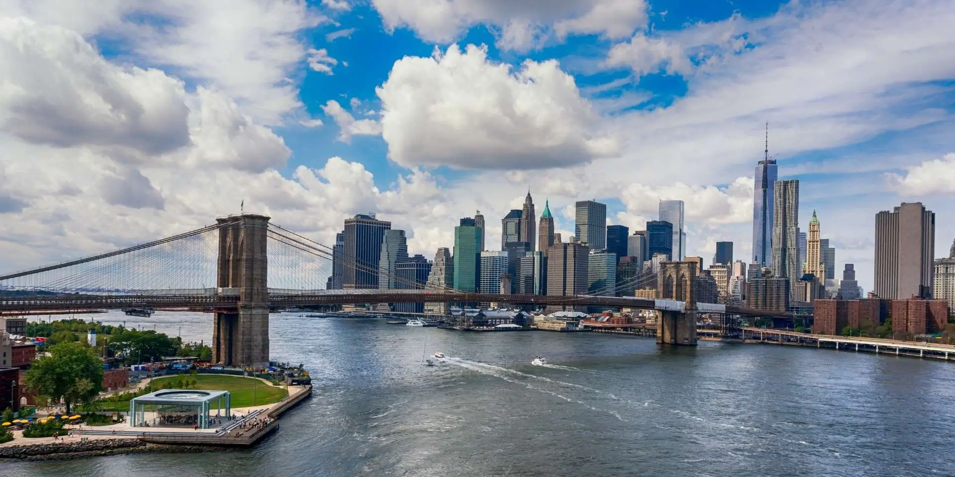 View of the New York City skyline with Brooklyn Bridge.