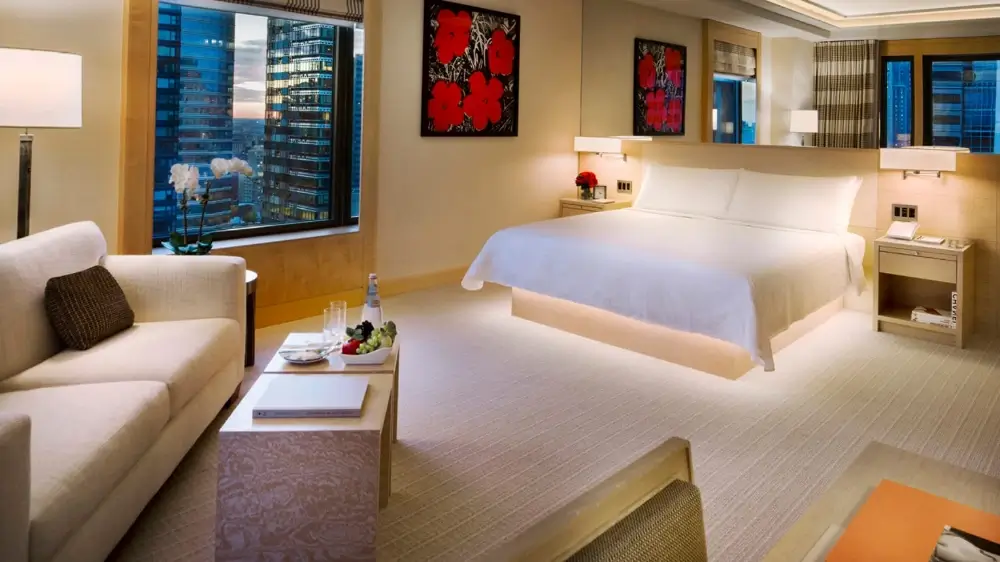 A premium suite with a seating area.
